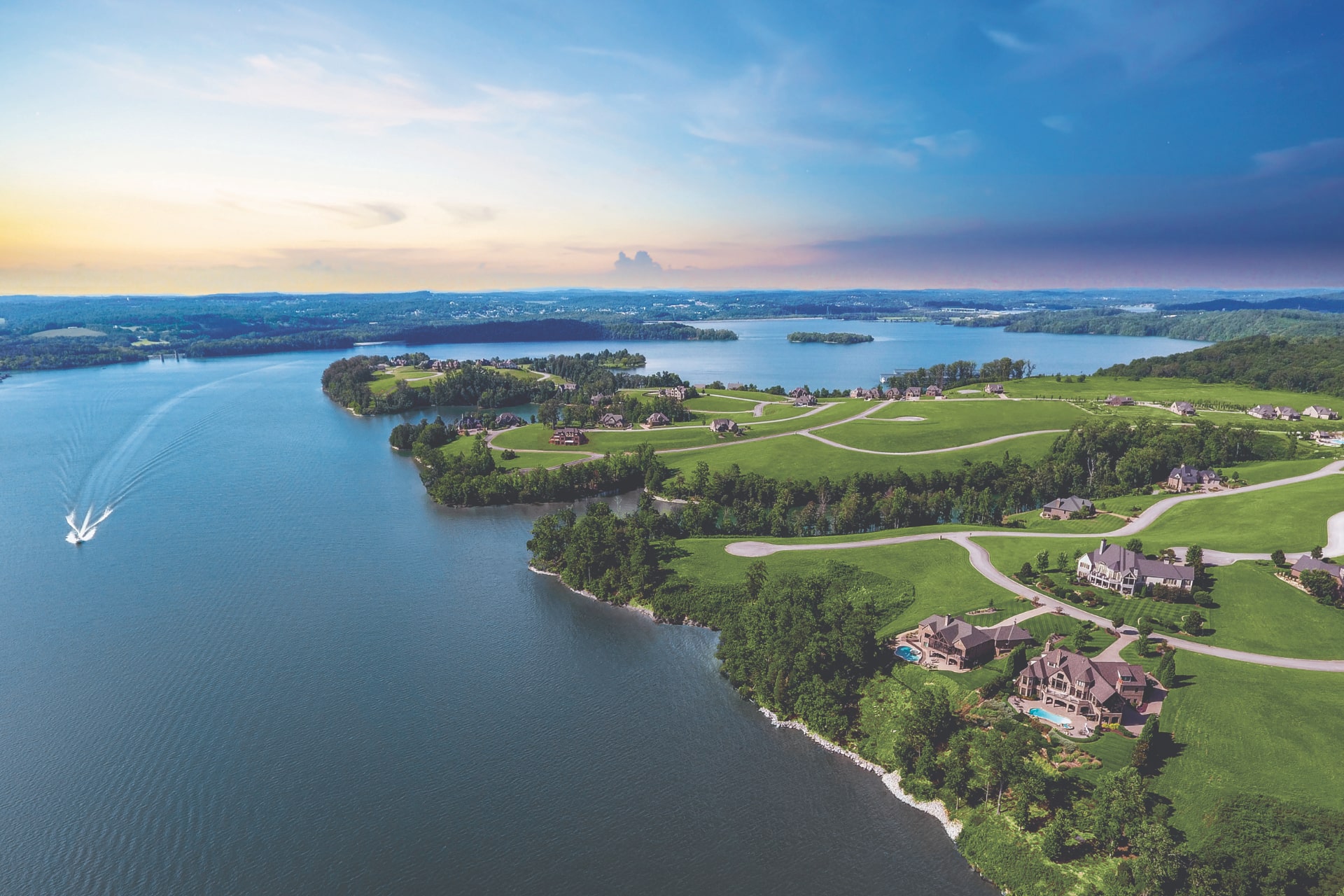 Aerial view of WindRiver, a gated lakefront and golf community.